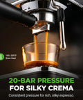 Close-up of Premium Twenty Bar Espresso Maker With Built In Milk Frother And One Point Eight Quart Removable Tank brewing silky espresso.