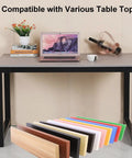Rock Solid Industrial Metal Table Frame With Heavy Duty Square Tube Furniture Legs And Adjustable Leveling Feet For Workbench Or Side Table In Matte Black. Table shown with laptop and colorful tabletop options.