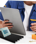 Person using Anti Static Circuit Board Holder And PCB Storage Rack For Secure Electronic Projects with tablet.