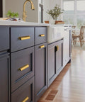 Kitchen cabinets with six pack antique brass cup pulls for cabinets and drawers, 5.04 inch center to center with classic brass finish.