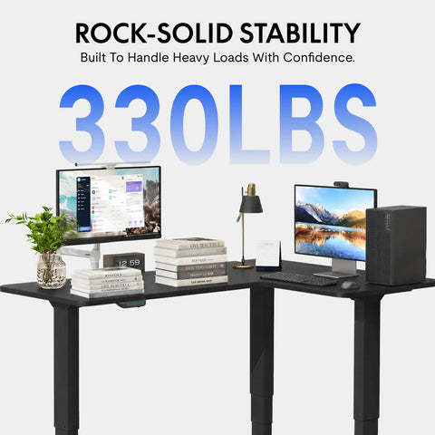 Rock Solid L Shaped Electric Standing Desk Triple Motor Height Adjustable Corner Workstation Sixty Three Inch Heavy Duty Sit Stand Home Office Desktop Smooth Operator For Multi Monitor Displays Black with dual monitors and books.