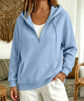 Model wearing Womens Oversized Zip Up Hoodie Fleece Pullover Sky Blue With Quarter Zip And Stand Up Collar for cozy casual look