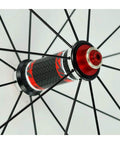 Close-up of carbon fiber hub with spokes on Badass 700C Road Bike Wheelset With 40mm Depth Quick Release Matte Aluminum Rim CV Brake