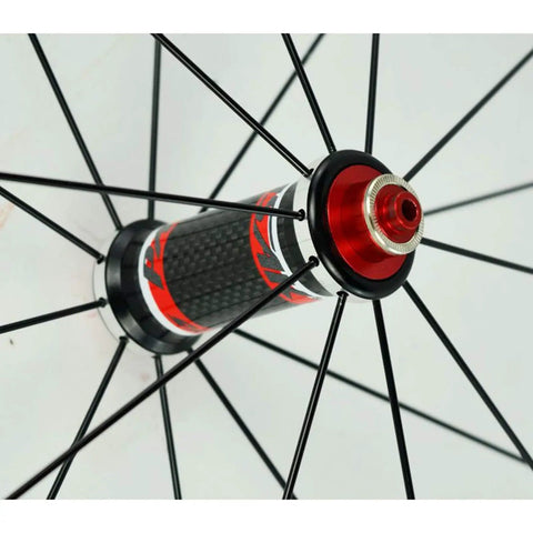 Close-up of carbon fiber hub with spokes on Badass 700C Road Bike Wheelset With 40mm Depth Quick Release Matte Aluminum Rim CV Brake