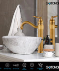 Antique Brass Bathroom Vessel Sink Faucet With Long Reach Single Handle Deck Mounted Mixer Tap For 1 Hole Installation Pop Up Drain Filtered Spout Rust Resistant Brass Construction Easy Hot And Cold Control on marble countertop with decor.