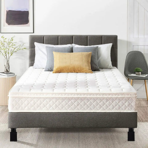 Bedroom with gray upholstered bed, white mattress, and adjustable furniture feet for stability.