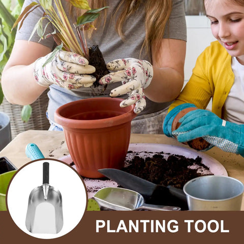 Stainless Steel Garden Hand Trowel Go To Transplanting And Soil Loosening Tool Small Square Shovel in use for planting indoors.