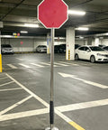 Heavy Duty Flexible Delineator Post For Concrete Mounting Impact Resistant Traffic Bollard in parking garage with stop sign