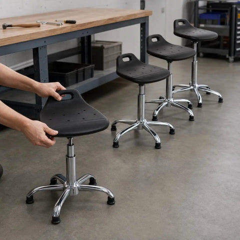 Built Tough Antistatic Shop Stool Height Adjustable Rolling Work Seat With Swivel Casters For Cleanrooms And Assembly Lines in a workshop setting.
