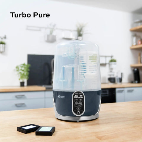 Ultra Fast Steam Sterilizer And Dryer For Baby Bottles Pacifiers And Pump Parts With HEPA Drying device on kitchen counter