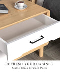 Open drawer with Ten Pack 5 Inch Matte Black Cabinet Handles for Cabinets and Drawers, Dope Modern Cylindrical Kitchen Pulls With One Piece Construction.