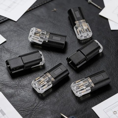 Double Wire Plug In Connectors With Locking Buckle No Wire Stripping Required Quick Connect Two Pin Electrical Splice With Flame Retardant Housing For Automotive LED Strip Lights And Low Voltage Repair shown on a black surface