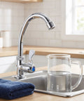 UKCOCO Countertop Kitchen Sink Tap, Plastic Vertical Replacement Faucet with 2cm Mount Base in a modern kitchen sink.