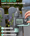Programmable Sprinkler Timer For Garden Hose And Soaker Hose with LCD display and manual controls, attached to outdoor tap