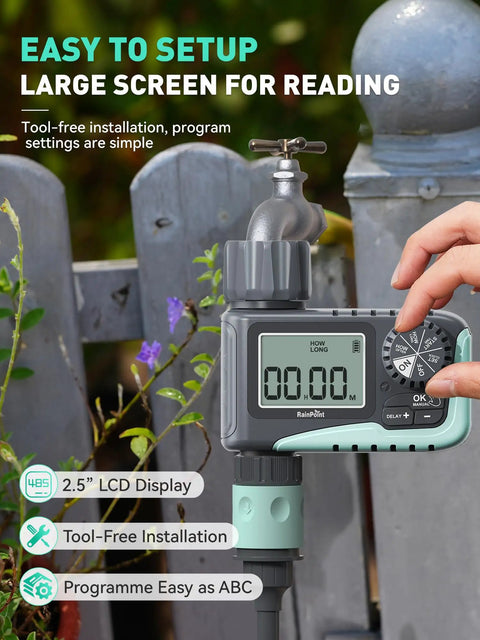 Programmable Sprinkler Timer For Garden Hose And Soaker Hose with LCD display and manual controls, attached to outdoor tap