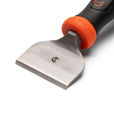 Close-up of a 3 Inch Brick Chisel With Heavy Duty Hand Guard For Masonry Projects, showing the sharp edge and non-slip grip handle.