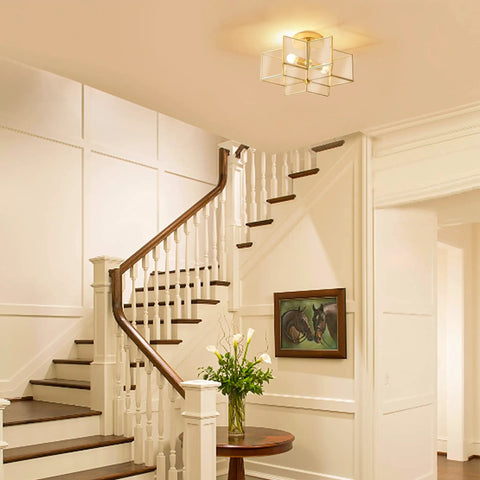 Interior with Two Light Star Ceiling Light with Glass Shade in Modern Brass Finish close to ceiling flush mount in entryway