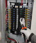 Heavy Duty 10 Inch Cable Cutters Featuring High Leverage Grip For Snipping 4/0 Aluminum And 2/0 Soft Copper Plus 100 Pair Com Cables shown in use inside an electrical panel.
