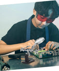 Person using Pro Grade Repair Clip Magnifying Mirror And PCB Holder For Soldering Station with Helping Hands and magnifying glass