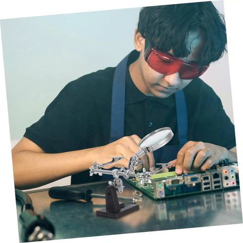 Person using Pro Grade Repair Clip Magnifying Mirror And PCB Holder For Soldering Station with Helping Hands and magnifying glass