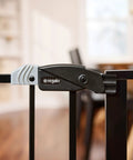 Extra Wide Baby Gate 29 To 49 Inches For Doorways And Stairs, pressure mounted safety gate latch detail, black color, indoor use.