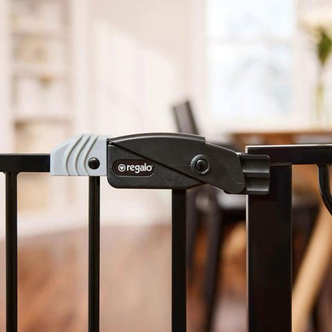 Extra Wide Baby Gate 29 To 49 Inches For Doorways And Stairs, pressure mounted safety gate latch detail, black color, indoor use.
