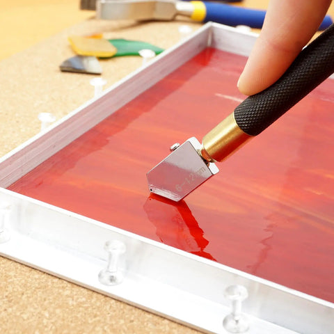 Pro Grade Stained Glass Layout Block Kit Comes With Eighty Durable Push Pins Includes 12 8 6 And 3 Inch Templates To Keep Your Designs Dead Square And Make Crafting A Walk In The Park cutting stained glass with precision tool on red piece
