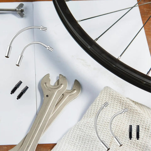 V Brake Noodle Cable Guide Pipe Kit with Rubber Boots for MTB Rigs and More, featuring 90° and 110° bend pipes, spanners, and bike wheel.