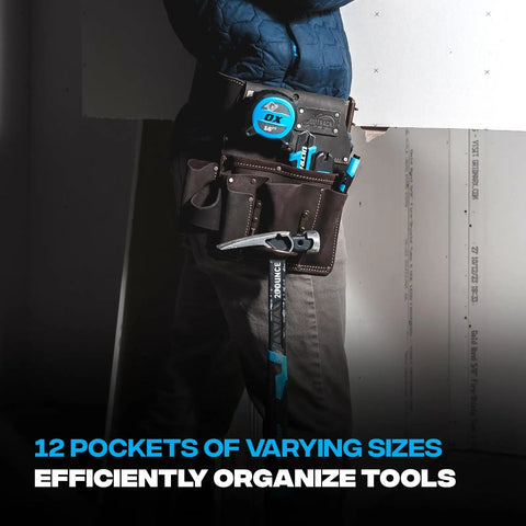 Person wearing oil tanned leather drywall tool pouch with hammer loop and double stitching, showing 12 pockets for tools.
