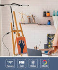 Dope 34.25 Inch Architect Desk Lamp in Black for Home Office, illuminating a modern workspace with adjustable swing arm