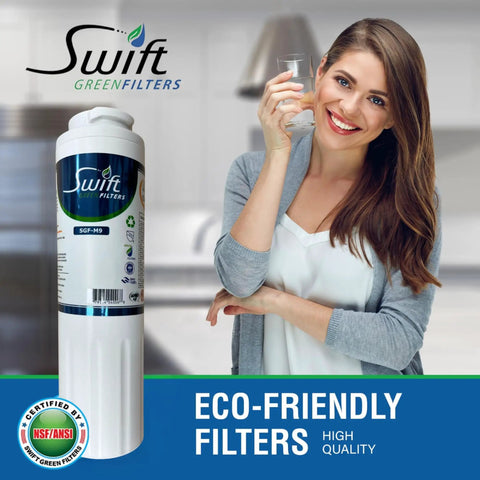 Woman holding glass next to SGF M9 Replacement Water Filter For UKF8001 And EDR4RXD1 Systems, Coconut Carbon Block, 1 Pack, in kitchen