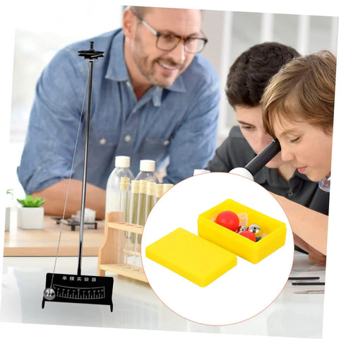 Single Pendulum Ball Experiment Tool For Physics Education in use by students and teacher in a middle school classroom setting.