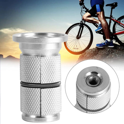 Close-up of Road Bike Upgrade: Beefy 28.6mm Front Fork Compression Plug for Carbon Forks, displaying stainless steel and aluminum alloy material.
