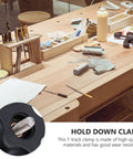 Pro-Grade T-Track Clamp Quick-Act Hold-Down For Woodworking And Carpentry on a workbench, T-track clamp close-up view.