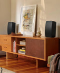 Five Wireless HiFi Speaker With Deep Bass AirPlay 2 Easy App Control Room Filling Sound Tuned By Giles Martin Black Finish on shelf
