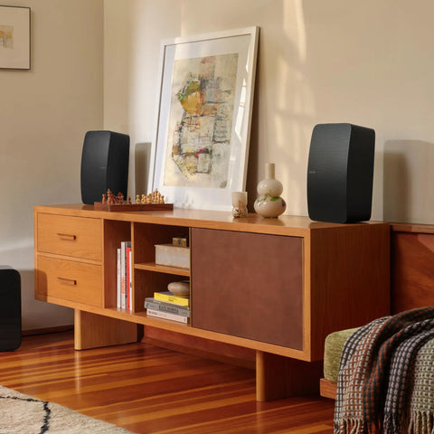Five Wireless HiFi Speaker With Deep Bass AirPlay 2 Easy App Control Room Filling Sound Tuned By Giles Martin Black Finish on shelf