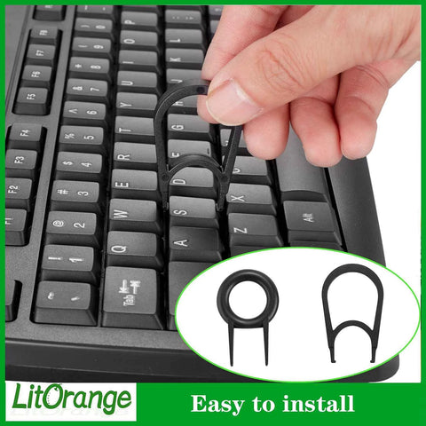 LitOrange silicone switch dampeners for Cherry MX keyboards; black O-rings being installed on a key, 500-pack.