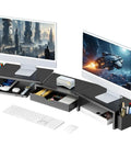 Dual Monitor Stand Riser With Drawer And Magnetic Pen Holders Adjustable Desk Organizer For Home Office Keeps Your Desk Setup Clean And Neat Sturdy Computer Monitor Stand With Top Shelf Black, holding two screens and showing the drawer and pen holders.