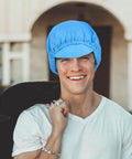 Slick Blue Anti Static Cap Set Made For Cleanroom Tasks And Factory Floors Featuring A Breathable Mesh Build worn by smiling man.