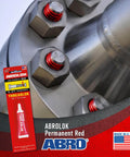 Heavy Duty Red Threadlocker High Strength Industrial Grade Adhesive Built For Automotive And Manufacturing Keeps Fasteners Tight Against Vibration And Heat Permanent Bond And High Temperature Resistance applied on bolts