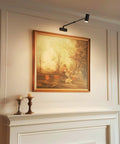Battery Operated Picture Light With Telescoping Arm, Adjustable 7.8 To 13.8 Inches, Silver Finish, illuminates framed painting on wall