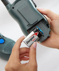 Hand inserting 9V Alkaline Batteries, 2 Pack, Long Lasting Power For Smoke Detectors, Meters, Toys, And Everyday Electronics, Reliable 9 Volt Battery Pack For Home Use into device