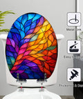 Elongated Colorful Stained Glass Effect Abstract Leaf Radiant Toilet Seat viewed from above with vibrant colors and metal fittings.
