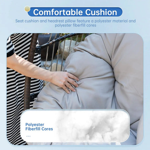 Close-up of a hand adjusting the UV resistant cushion on a Cozy Outdoor Hanging Egg Chair With Stand for bedroom or garden relaxation.