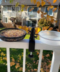 Two Pack Plastic Round Bird Feeder Bowls For Wild Birds Seed Tray And Water Bowl At Feeding Stations installed on a fence