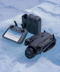 Mavic 4 Pro Drone Fly More Combo With RC 2, 100MP 4/3 Hasselblad Camera, charging hub on icy surface.