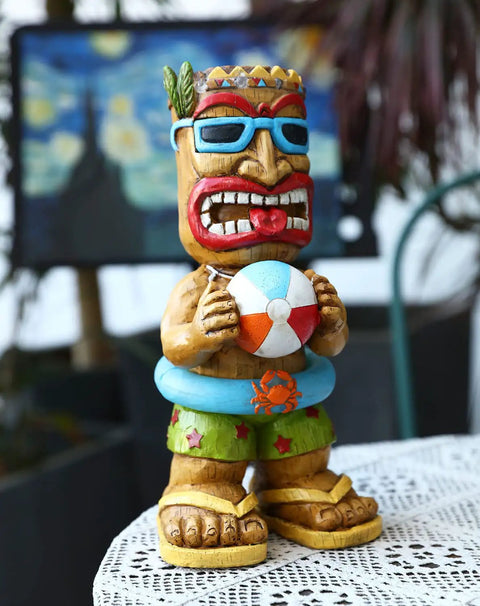 16.7 Inch Tiki Garden Statue With Solar Powered Lantern Lights, Large Hawaiian Tiki Man Figurine holding beach ball on table