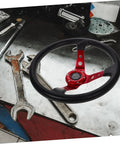 Dope 14 Inch PU Racing Steering Wheel For Cars Golf Carts And Trucks, Ergonomic Grip, Red Finish With Horn Button on workbench