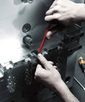 Mechanic using Hex Key For 950 SPKL 5/32 Inch L Key Hex Plus with Pro Grade Rubber Grip Sleeve on metal machine in workshop.