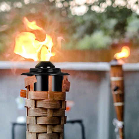 Close-up of torch replacement canisters for bamboo lanterns, refillable outdoor torches, yard patio deck garden party decor, 16oz 6 pack.